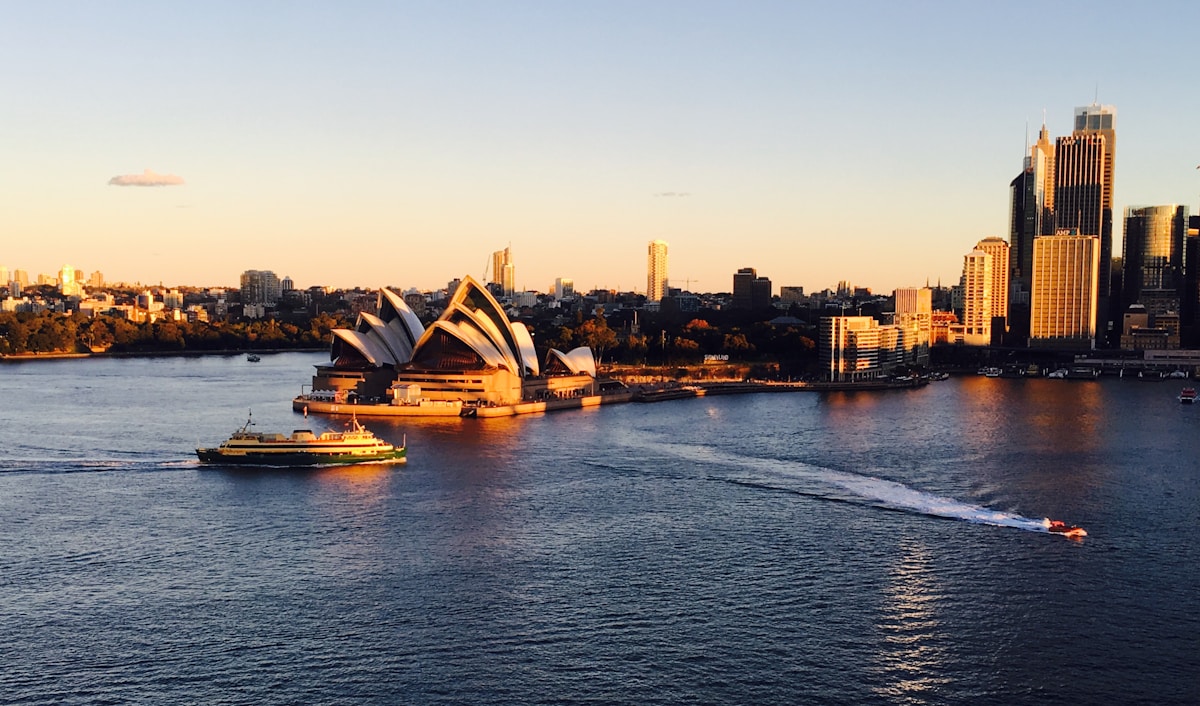 Sydney Opera House and harbour at golden hour