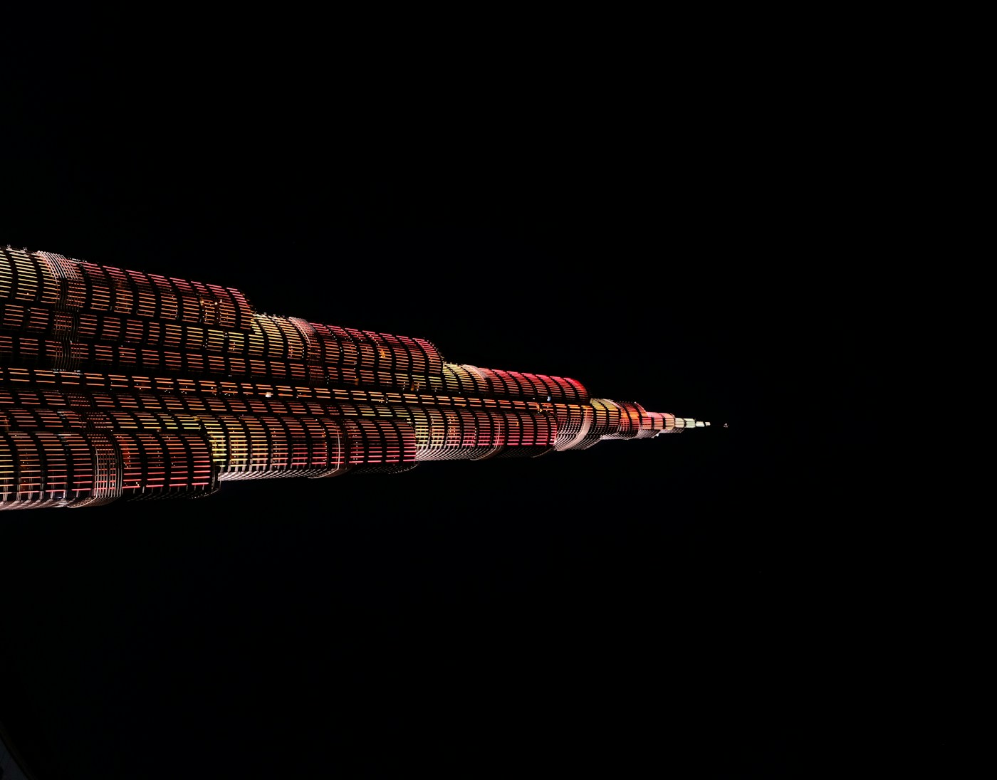 Burj Khalifa illuminated against the Dubai night sky