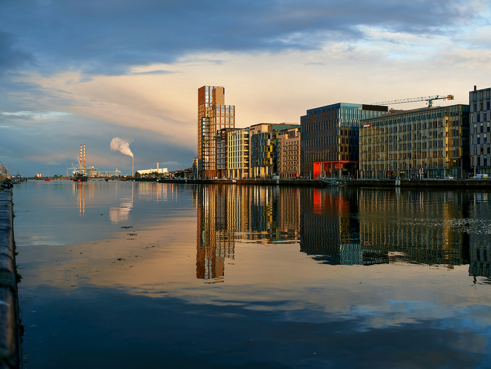 Dublin skyline reflected in the River Liffey at sunset