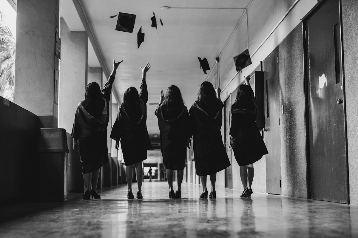 Graduates celebrating on campus
